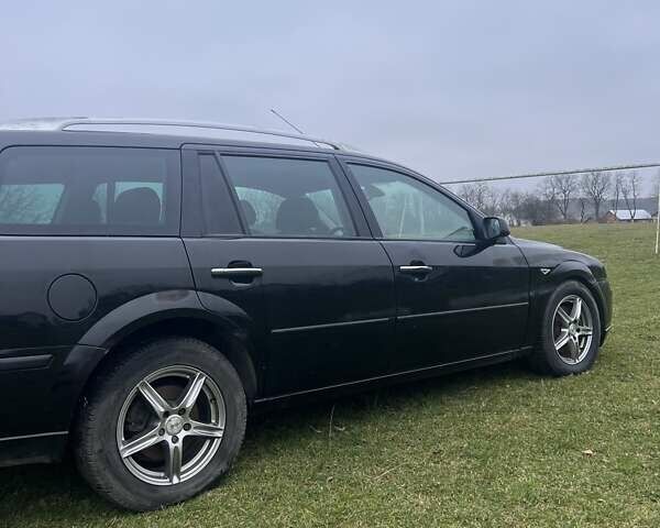 Черный Форд Мондео, объемом двигателя 2 л и пробегом 250 тыс. км за 3135 $, фото 8 на Automoto.ua