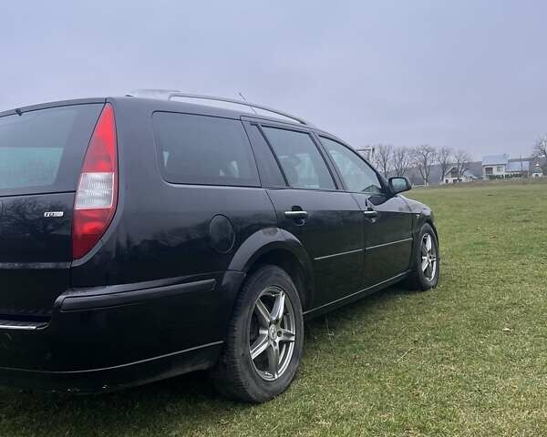 Черный Форд Мондео, объемом двигателя 2 л и пробегом 250 тыс. км за 3135 $, фото 7 на Automoto.ua