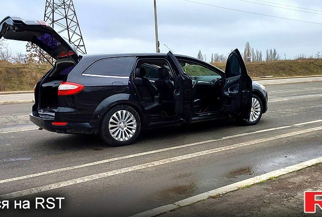 Чорний Форд Мондео, об'ємом двигуна 2 л та пробігом 321 тис. км за 6000 $, фото 4 на Automoto.ua