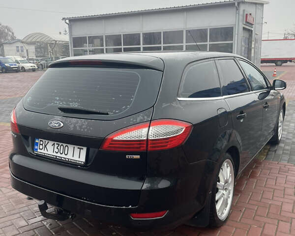 Черный Форд Мондео, объемом двигателя 2 л и пробегом 290 тыс. км за 6600 $, фото 10 на Automoto.ua