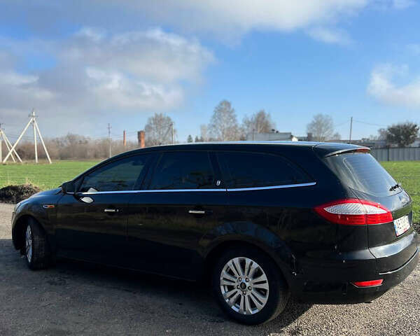 Черный Форд Мондео, объемом двигателя 2 л и пробегом 250 тыс. км за 6750 $, фото 5 на Automoto.ua