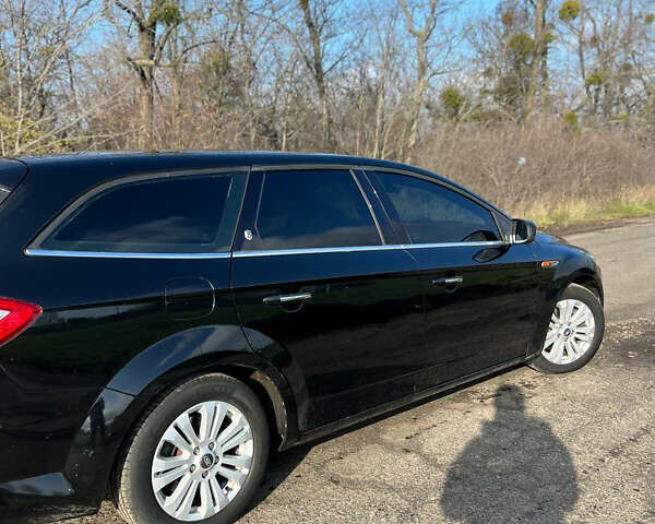 Черный Форд Мондео, объемом двигателя 2 л и пробегом 250 тыс. км за 6750 $, фото 6 на Automoto.ua