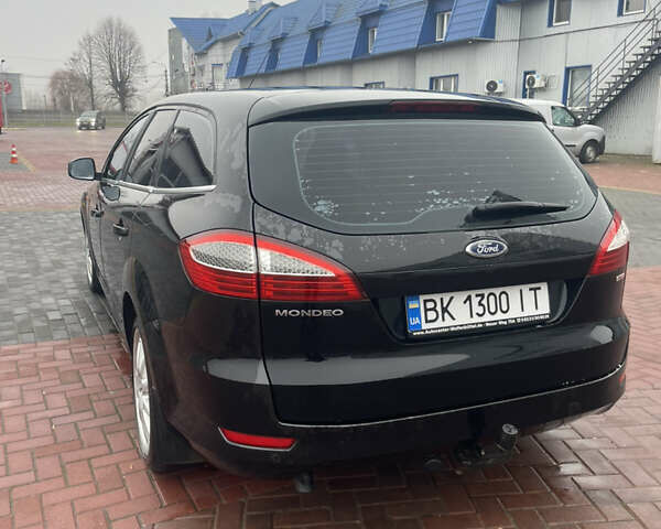 Черный Форд Мондео, объемом двигателя 2 л и пробегом 290 тыс. км за 6600 $, фото 7 на Automoto.ua