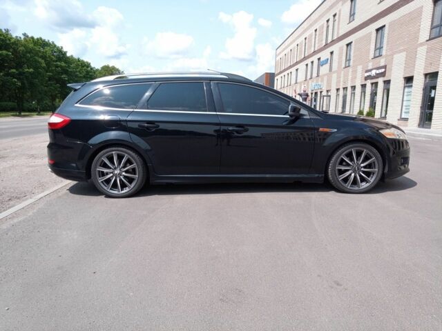 Черный Форд Мондео, объемом двигателя 2.2 л и пробегом 325 тыс. км за 7900 $, фото 5 на Automoto.ua