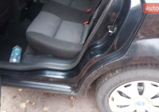 Черный Форд Мондео, объемом двигателя 1.8 л и пробегом 312 тыс. км за 5800 $, фото 4 на Automoto.ua
