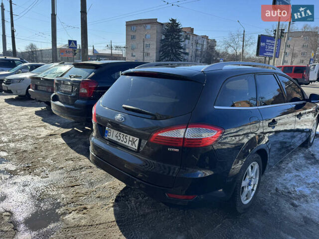 Черный Форд Мондео, объемом двигателя 2 л и пробегом 309 тыс. км за 7499 $, фото 3 на Automoto.ua