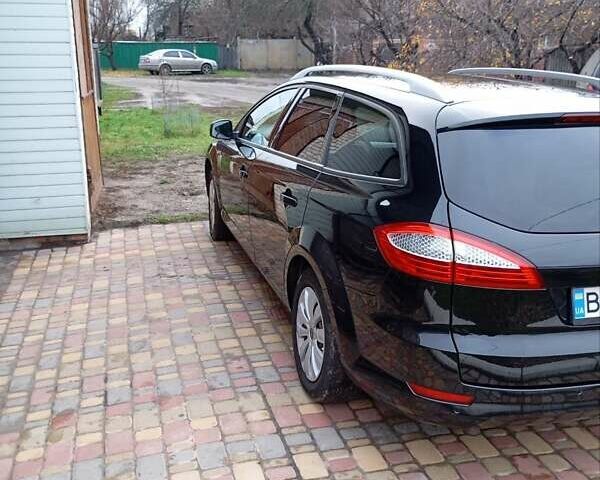 Черный Форд Мондео, объемом двигателя 2 л и пробегом 217 тыс. км за 6700 $, фото 9 на Automoto.ua