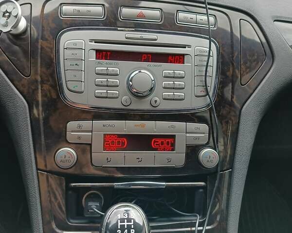 Черный Форд Мондео, объемом двигателя 1.8 л и пробегом 345 тыс. км за 6800 $, фото 14 на Automoto.ua