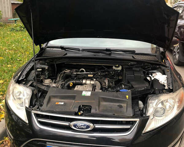 Черный Форд Мондео, объемом двигателя 1.6 л и пробегом 237 тыс. км за 7700 $, фото 13 на Automoto.ua