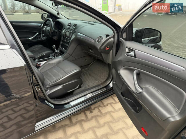 Чорний Форд Мондео, об'ємом двигуна 2.2 л та пробігом 274 тис. км за 7777 $, фото 26 на Automoto.ua