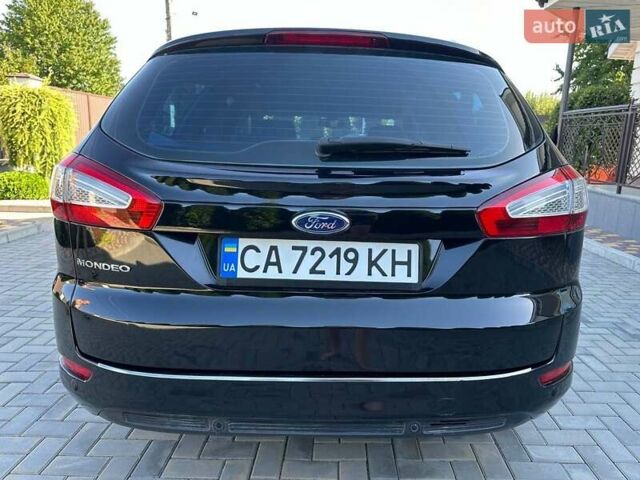 Черный Форд Мондео, объемом двигателя 2 л и пробегом 300 тыс. км за 8200 $, фото 4 на Automoto.ua
