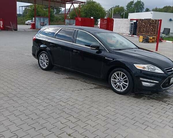 Черный Форд Мондео, объемом двигателя 2.2 л и пробегом 327 тыс. км за 8500 $, фото 10 на Automoto.ua