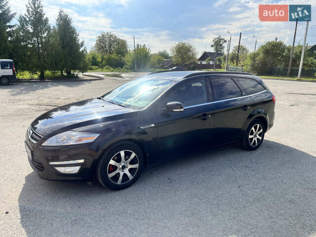Черный Форд Мондео, объемом двигателя 2 л и пробегом 320 тыс. км за 7400 $, фото 3 на Automoto.ua
