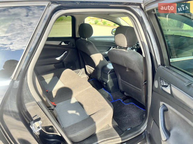 Черный Форд Мондео, объемом двигателя 2 л и пробегом 320 тыс. км за 7400 $, фото 9 на Automoto.ua