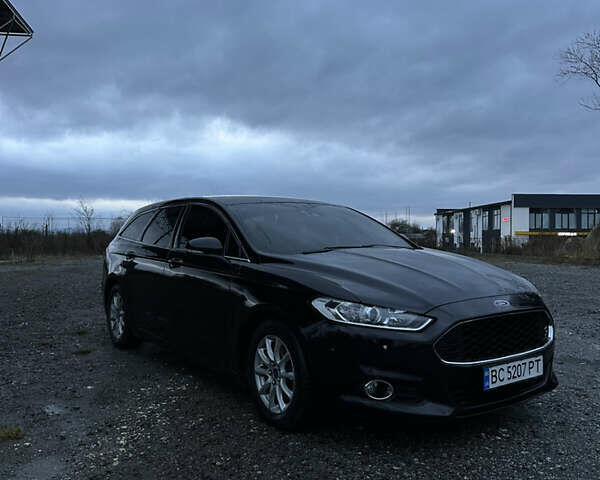 Черный Форд Мондео, объемом двигателя 2 л и пробегом 300 тыс. км за 10000 $, фото 4 на Automoto.ua