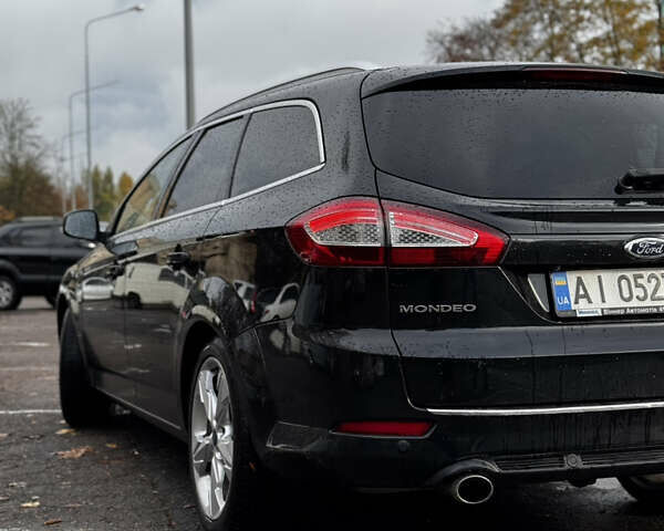 Черный Форд Мондео, объемом двигателя 2.18 л и пробегом 418 тыс. км за 12000 $, фото 7 на Automoto.ua