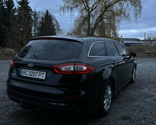 Черный Форд Мондео, объемом двигателя 2 л и пробегом 300 тыс. км за 10000 $, фото 5 на Automoto.ua