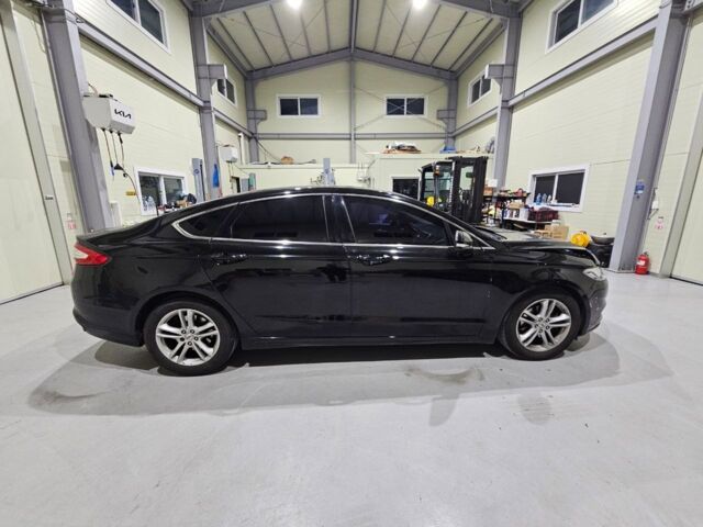 Черный Форд Мондео, объемом двигателя 2 л и пробегом 131 тыс. км за 11900 $, фото 6 на Automoto.ua