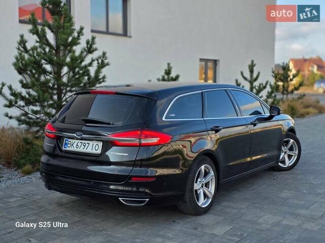 Черный Форд Мондео, объемом двигателя 2 л и пробегом 263 тыс. км за 14499 $, фото 42 на Automoto.ua