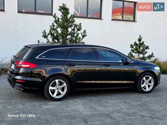 Черный Форд Мондео, объемом двигателя 2 л и пробегом 263 тыс. км за 14499 $, фото 39 на Automoto.ua