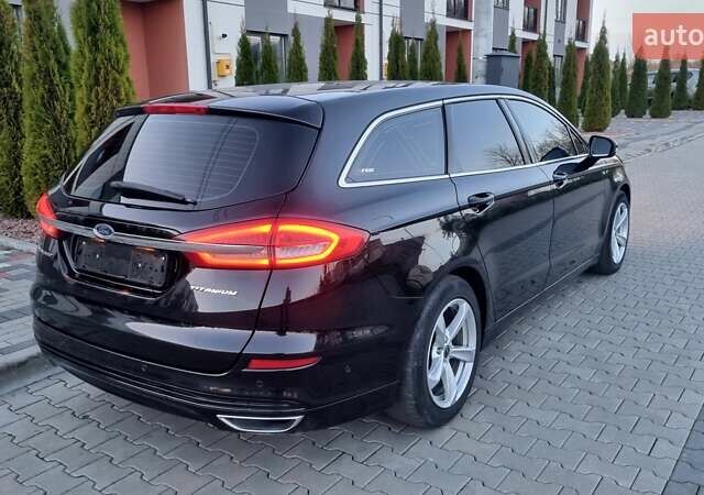 Черный Форд Мондео, объемом двигателя 2 л и пробегом 228 тыс. км за 13800 $, фото 11 на Automoto.ua