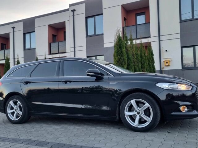 Черный Форд Мондео, объемом двигателя 2 л и пробегом 228 тыс. км за 13800 $, фото 2 на Automoto.ua