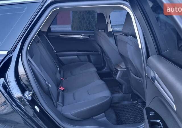 Черный Форд Мондео, объемом двигателя 2 л и пробегом 228 тыс. км за 13800 $, фото 17 на Automoto.ua