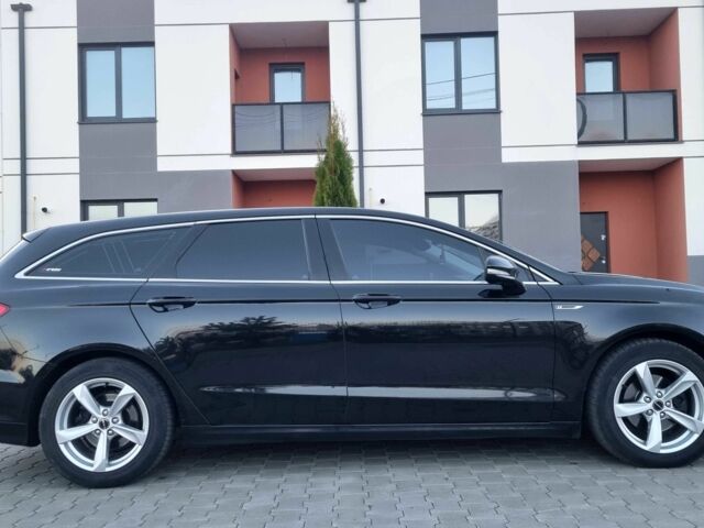 Черный Форд Мондео, объемом двигателя 2 л и пробегом 228 тыс. км за 13800 $, фото 3 на Automoto.ua