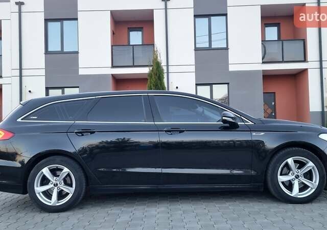 Черный Форд Мондео, объемом двигателя 2 л и пробегом 228 тыс. км за 13800 $, фото 8 на Automoto.ua