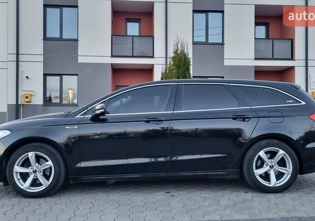 Черный Форд Мондео, объемом двигателя 2 л и пробегом 228 тыс. км за 13800 $, фото 28 на Automoto.ua