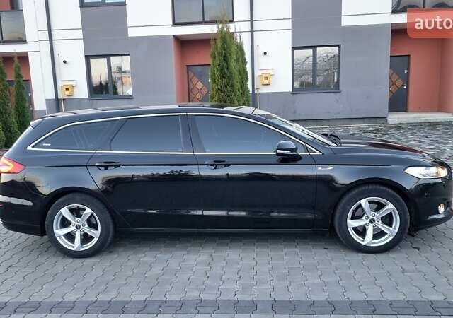 Черный Форд Мондео, объемом двигателя 2 л и пробегом 228 тыс. км за 13800 $, фото 7 на Automoto.ua