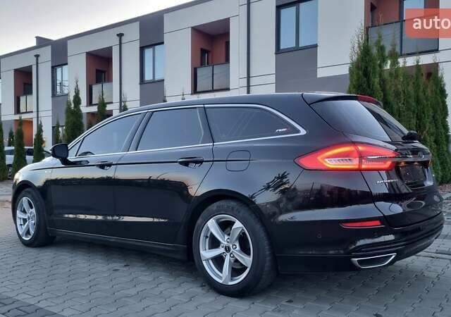 Черный Форд Мондео, объемом двигателя 2 л и пробегом 228 тыс. км за 13800 $, фото 30 на Automoto.ua