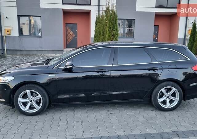 Черный Форд Мондео, объемом двигателя 2 л и пробегом 228 тыс. км за 13800 $, фото 27 на Automoto.ua