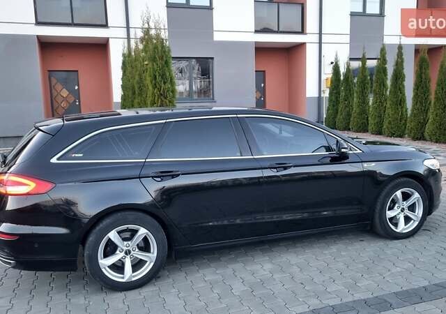 Черный Форд Мондео, объемом двигателя 2 л и пробегом 228 тыс. км за 13800 $, фото 9 на Automoto.ua