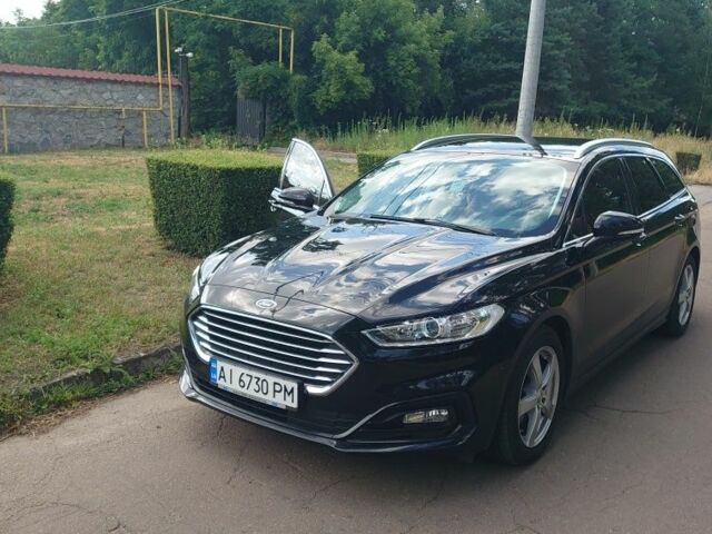 Чорний Форд Мондео, об'ємом двигуна 2 л та пробігом 260 тис. км за 17400 $, фото 6 на Automoto.ua