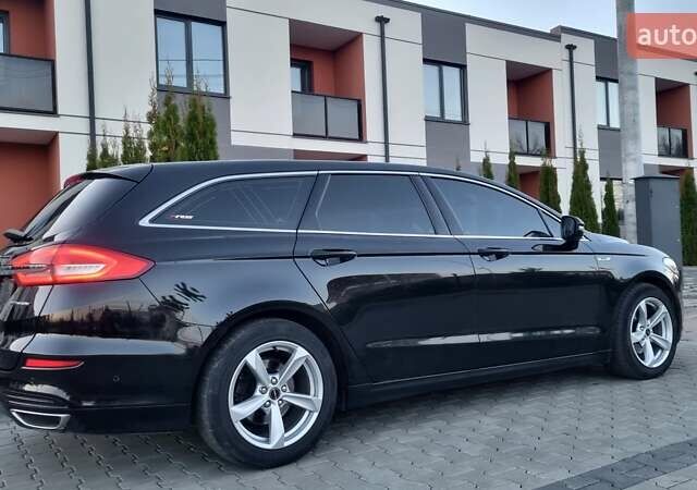 Черный Форд Мондео, объемом двигателя 2 л и пробегом 228 тыс. км за 13800 $, фото 10 на Automoto.ua