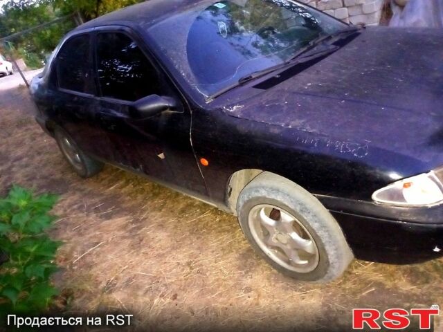 Черный Форд Мондео, объемом двигателя 1.8 л и пробегом 290 тыс. км за 1100 $, фото 1 на Automoto.ua