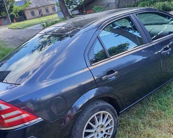 Черный Форд Мондео, объемом двигателя 2 л и пробегом 323 тыс. км за 3000 $, фото 1 на Automoto.ua