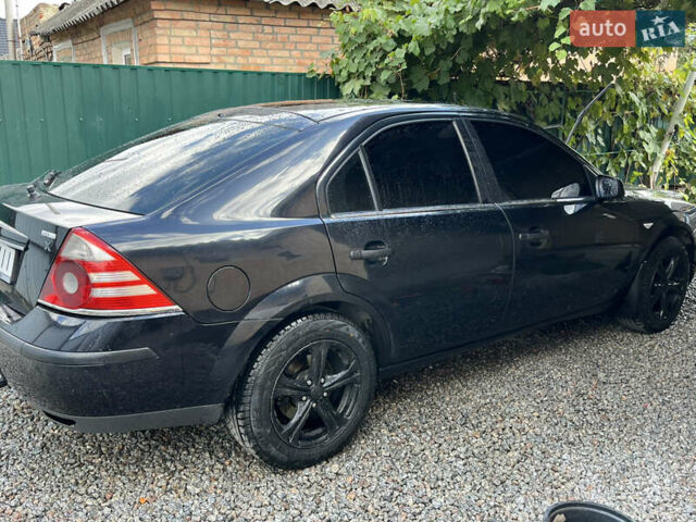 Чорний Форд Мондео, об'ємом двигуна 2 л та пробігом 420 тис. км за 4800 $, фото 13 на Automoto.ua