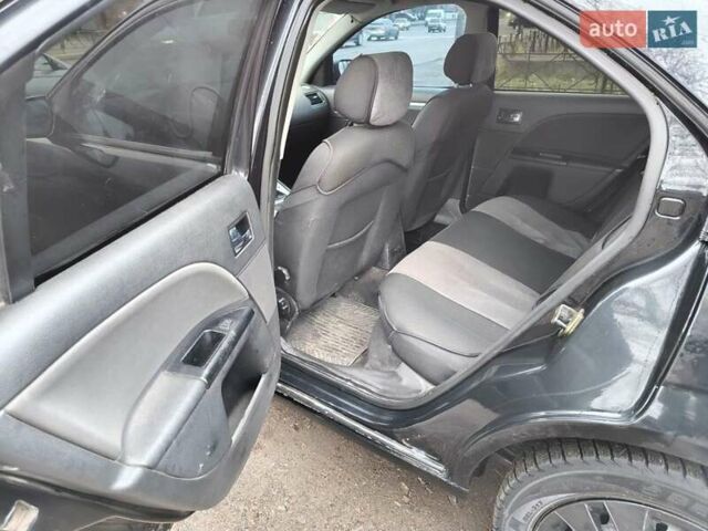 Чорний Форд Мондео, об'ємом двигуна 2 л та пробігом 330 тис. км за 3650 $, фото 4 на Automoto.ua