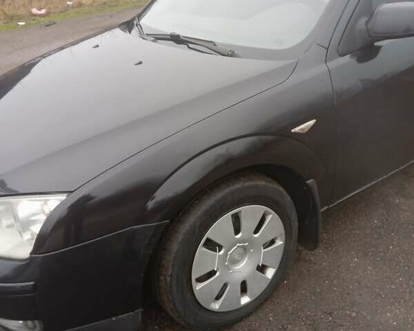 Черный Форд Мондео, объемом двигателя 2 л и пробегом 378 тыс. км за 3000 $, фото 6 на Automoto.ua