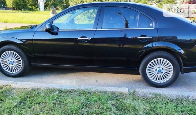 Черный Форд Мондео, объемом двигателя 2 л и пробегом 343 тыс. км за 5500 $, фото 6 на Automoto.ua