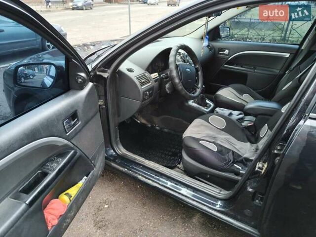 Чорний Форд Мондео, об'ємом двигуна 2 л та пробігом 330 тис. км за 3650 $, фото 3 на Automoto.ua