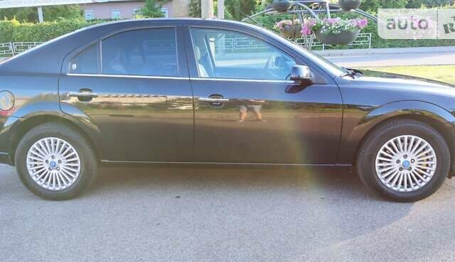 Черный Форд Мондео, объемом двигателя 2 л и пробегом 343 тыс. км за 5500 $, фото 7 на Automoto.ua