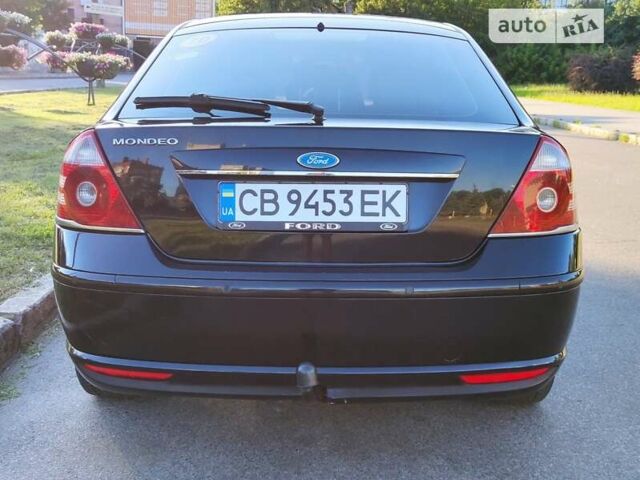 Черный Форд Мондео, объемом двигателя 2 л и пробегом 343 тыс. км за 5500 $, фото 4 на Automoto.ua