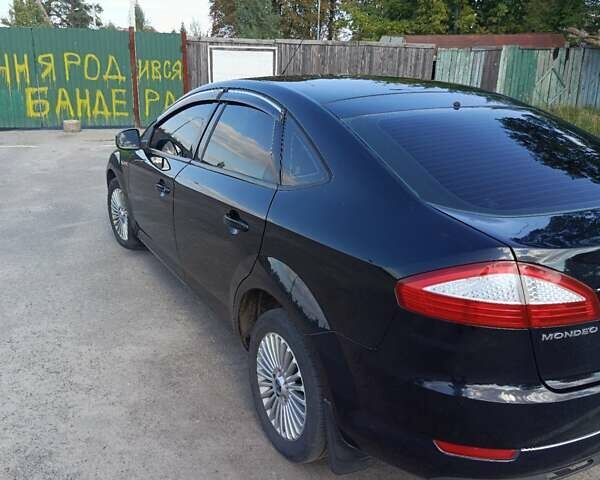Чорний Форд Мондео, об'ємом двигуна 2 л та пробігом 264 тис. км за 5500 $, фото 21 на Automoto.ua