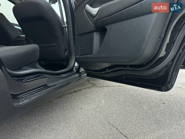 Чорний Форд Мондео, об'ємом двигуна 2 л та пробігом 266 тис. км за 6499 $, фото 29 на Automoto.ua