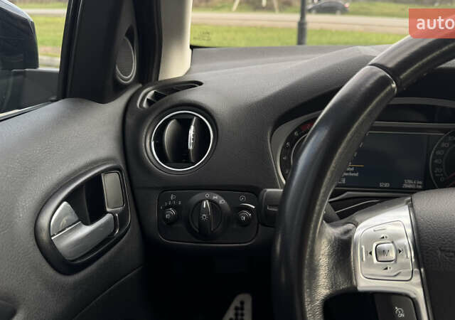 Чорний Форд Мондео, об'ємом двигуна 2 л та пробігом 204 тис. км за 6999 $, фото 21 на Automoto.ua