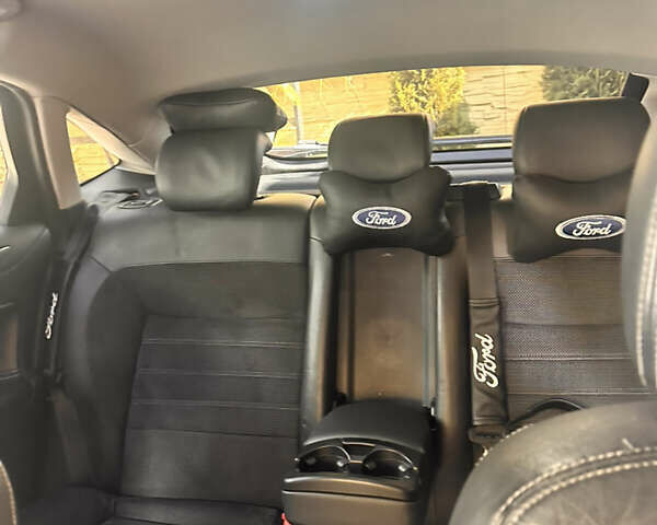 Форд Мондео 2011 в Черновцах на Automoto.ua Черный Форд Мондео, объемом двигателя 2 л и пробегом 233 тыс. км за 8500 $, фото 8 на Automoto.ua