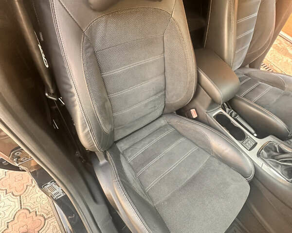 Форд Мондео 2011 в Черновцах на Automoto.ua Черный Форд Мондео, объемом двигателя 2 л и пробегом 233 тыс. км за 8500 $, фото 7 на Automoto.ua